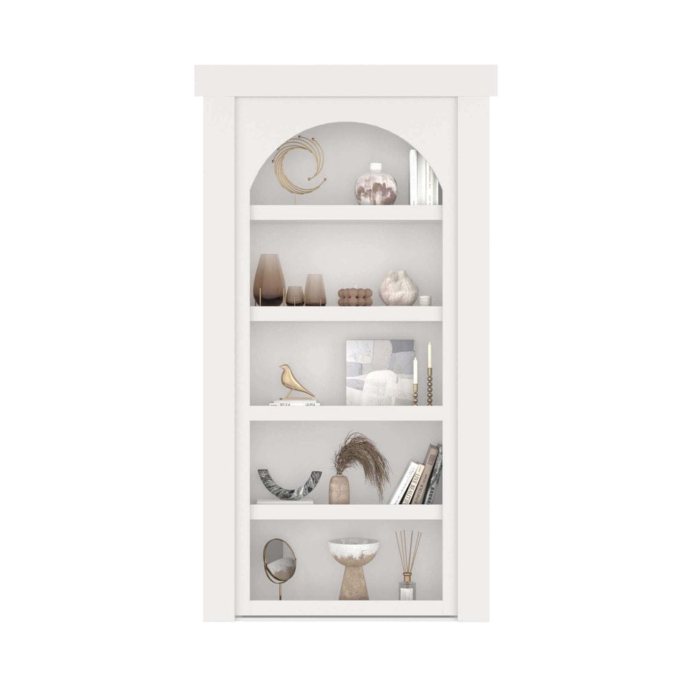 Murphy Door archway bookcase door in white, closed, with five shelves of decor