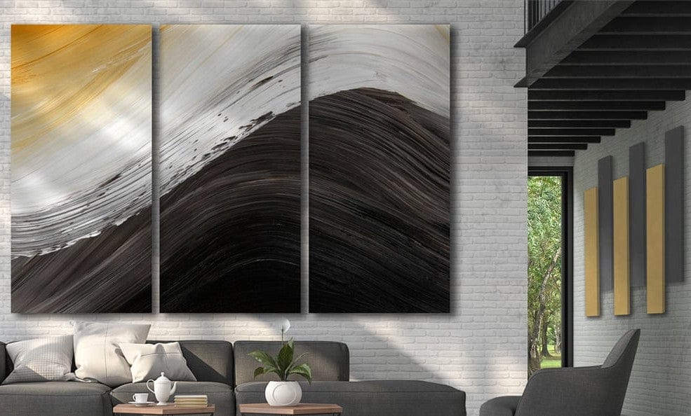 Three AcousticART printed panels hung as one picture above a sofa